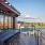 a spacious roof-top sitting area overlooking a body of water at The Oliver in Washington, DC