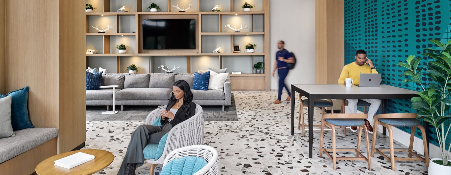 a clubroom with people working at The Oliver in Washington, DC