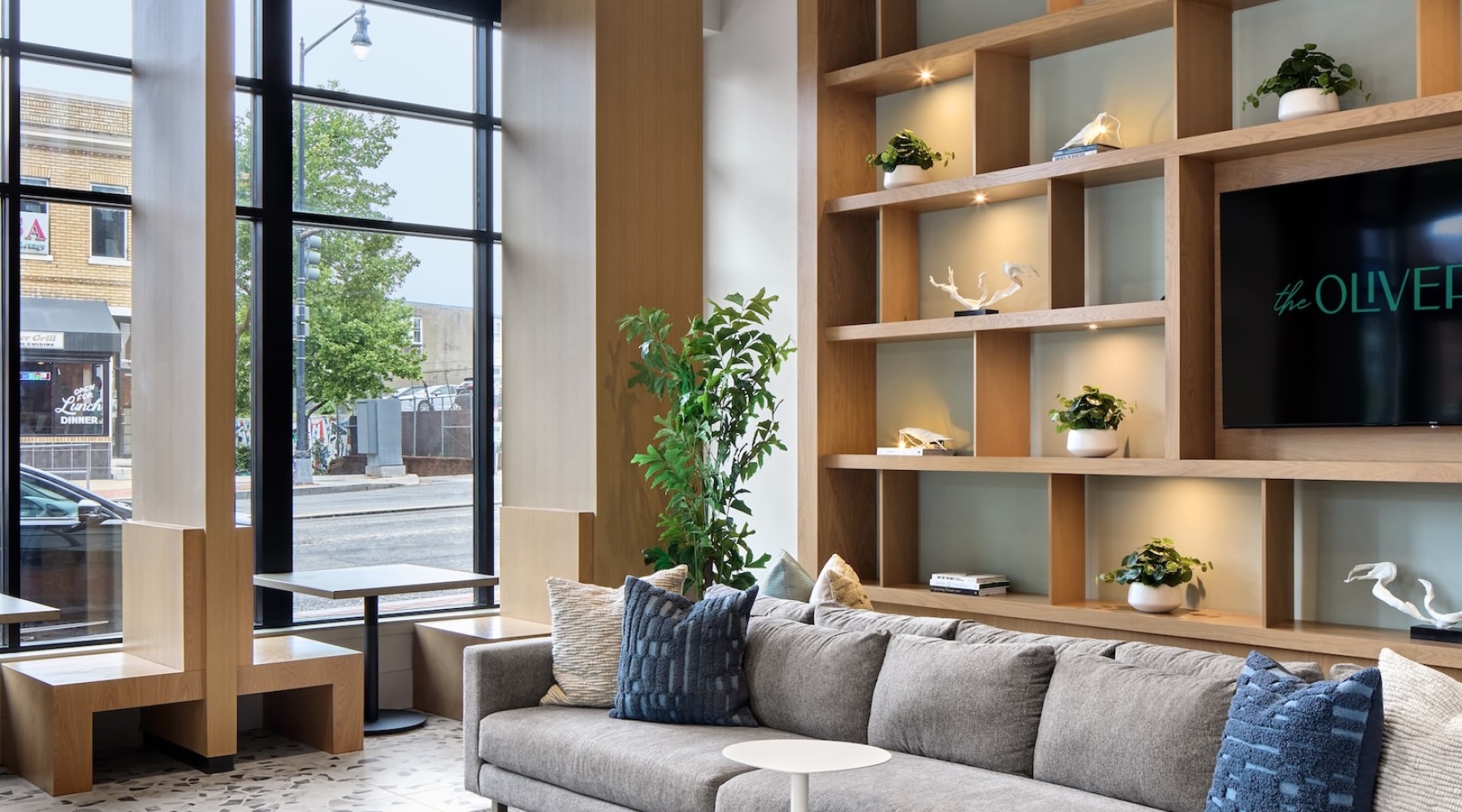 Beautiful clubroom with lounge seating and media area at The Oliver in Washington, DC