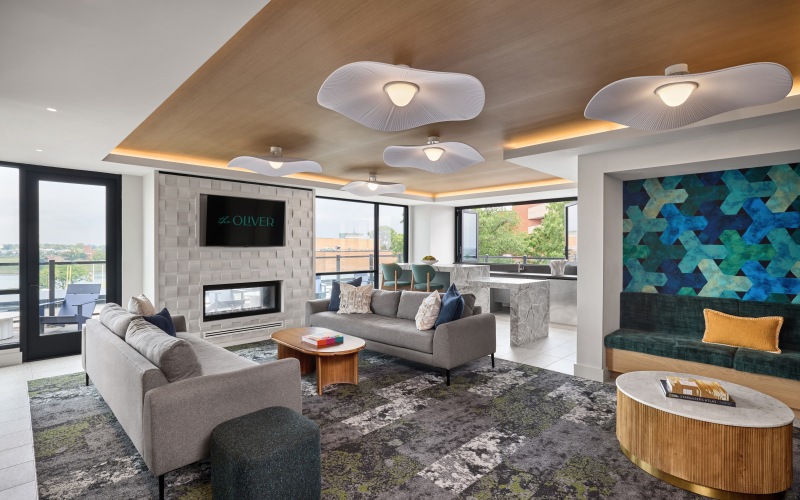 a lounge with seating tables 