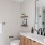 toilet and vanity with sink in bathroom