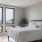 bright bedroom with city views