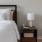 bedside table next to bed