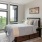 large, bright windows in bedroom