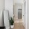 entrance hallway with mirror and bench